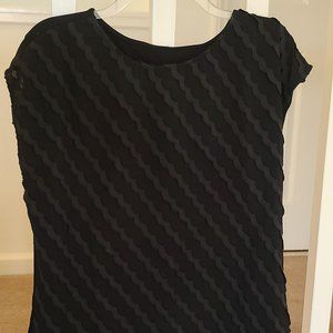 Black Blouse with ruffles flowing down the front